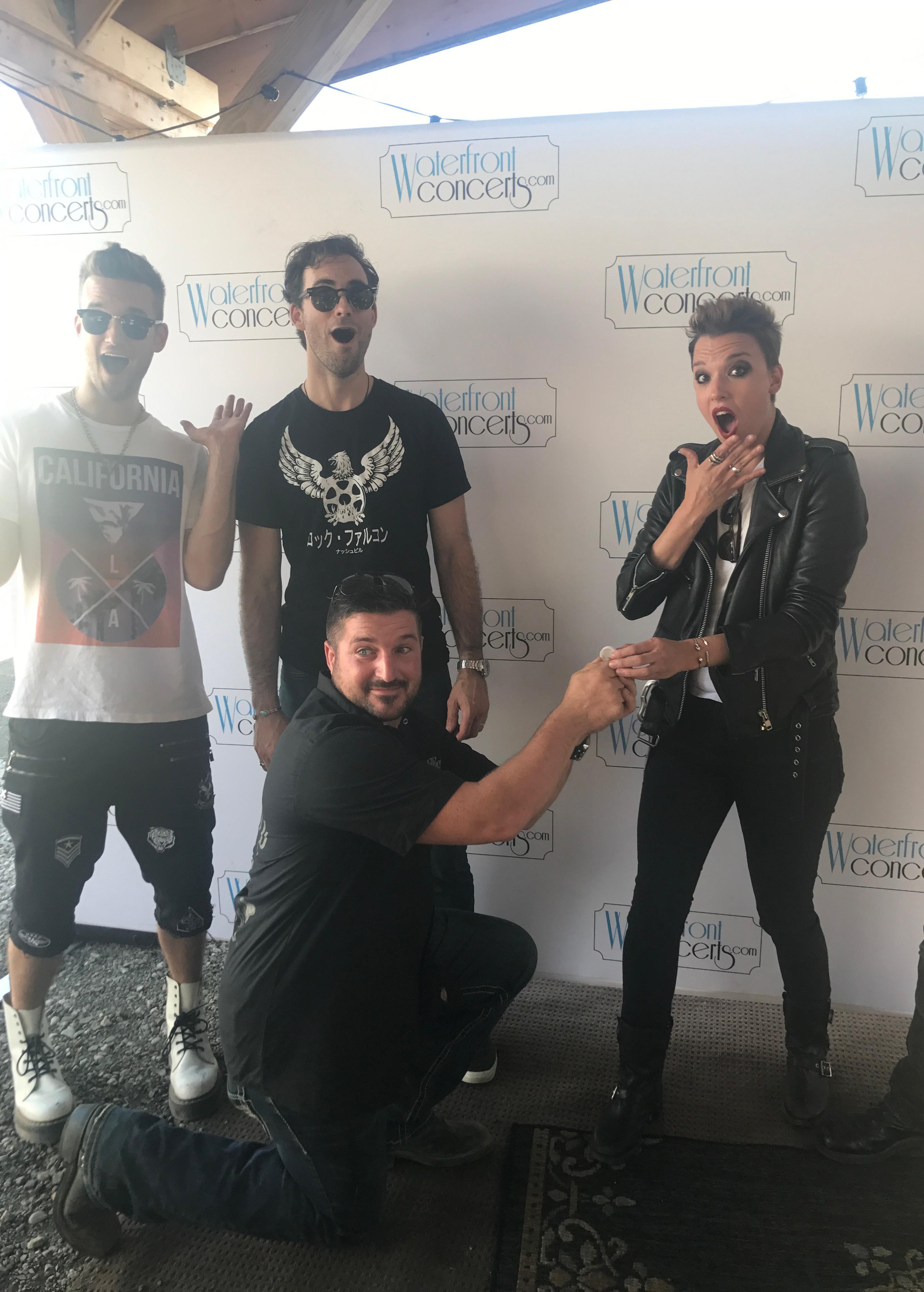 Meet-and-greet photo with public figures, performers, and event guests.