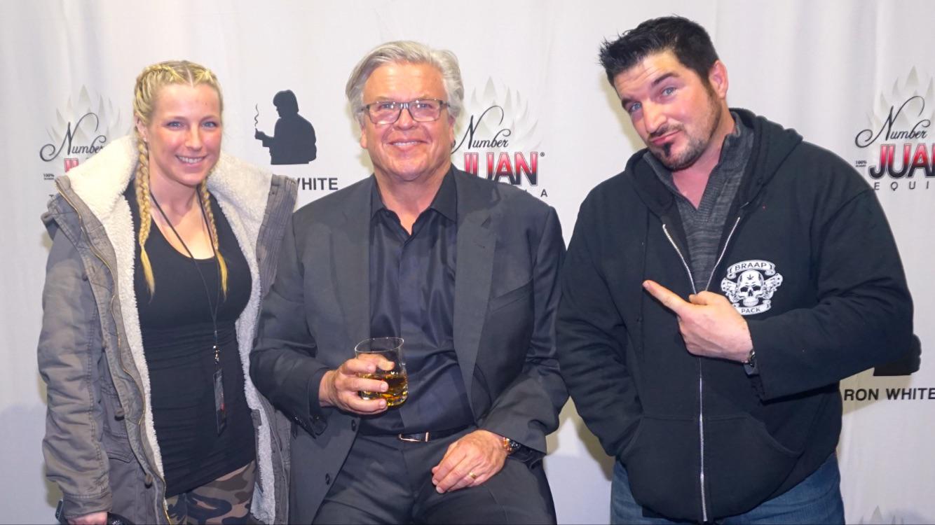 Meet-and-greet photo with public figures, performers, and event guests.
