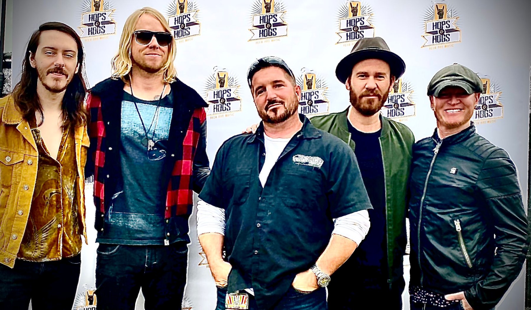 Meet-and-greet photo with public figures, performers, and event guests.