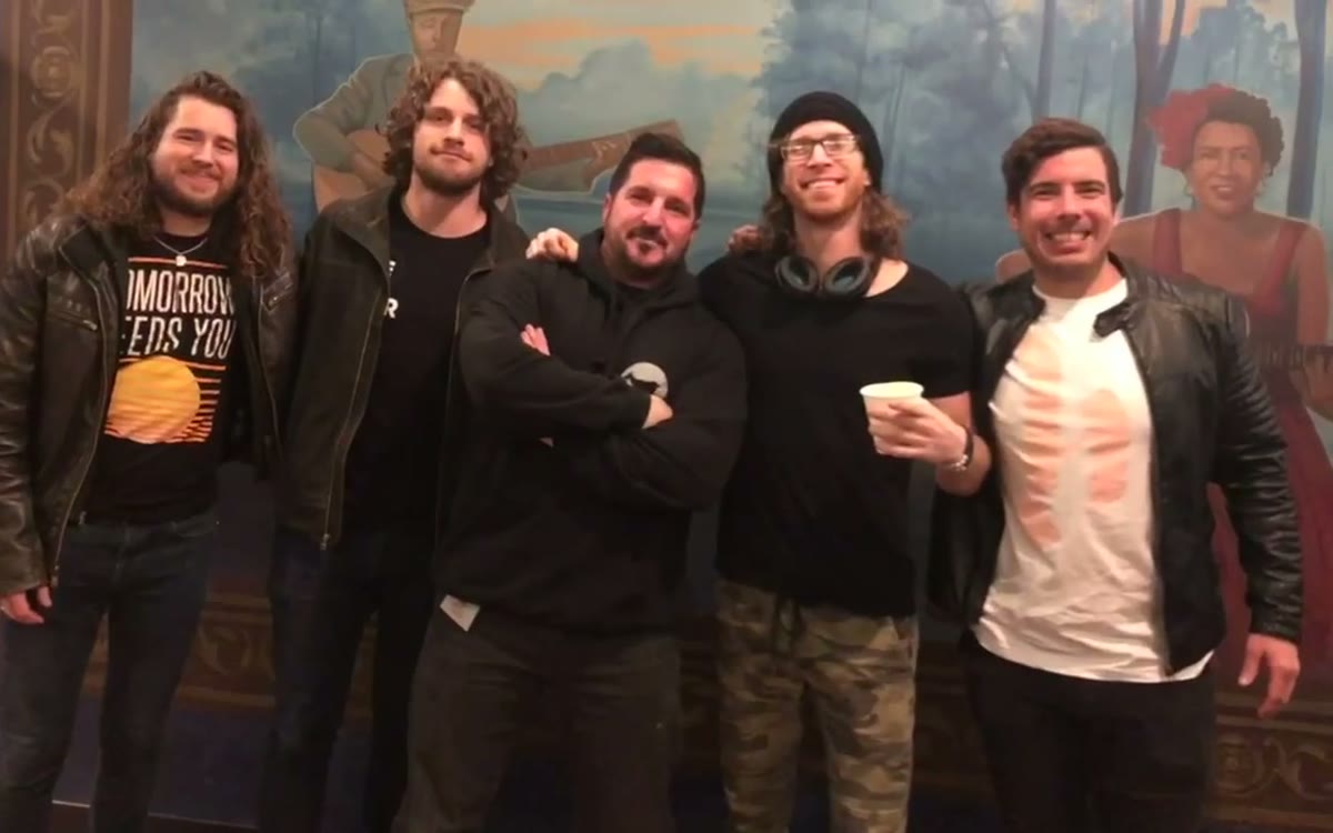 Meet-and-greet photo with public figures, performers, and event guests.