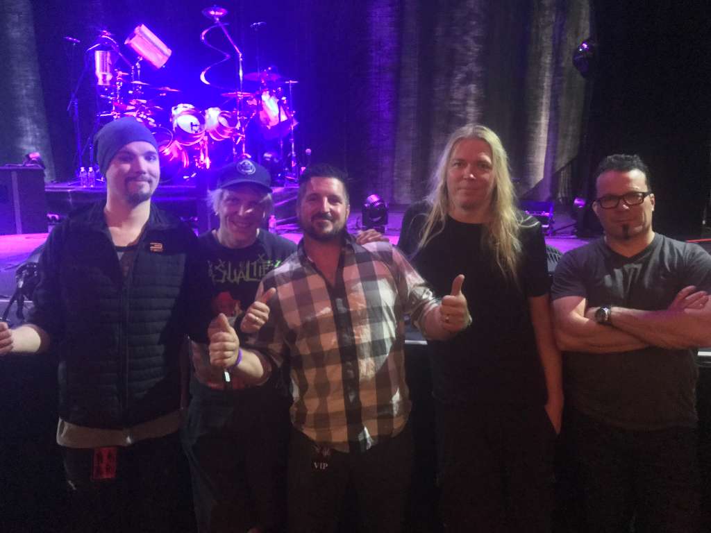 Meet-and-greet photo with public figures, performers, and event guests.