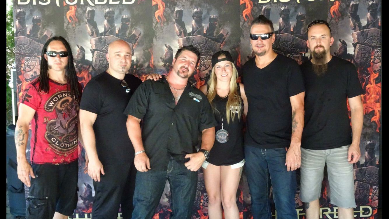 Meet-and-greet photo with public figures, performers, and event guests.