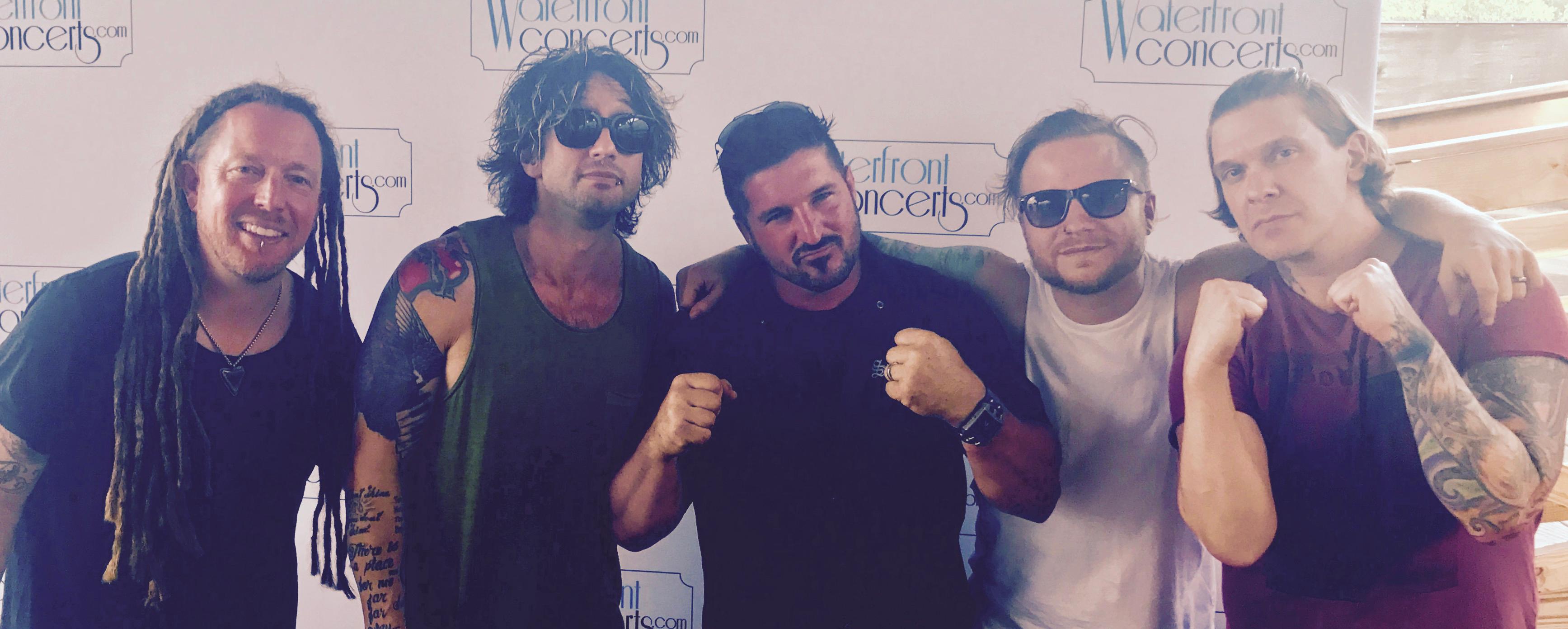 Meet-and-greet photo with public figures, performers, and event guests.